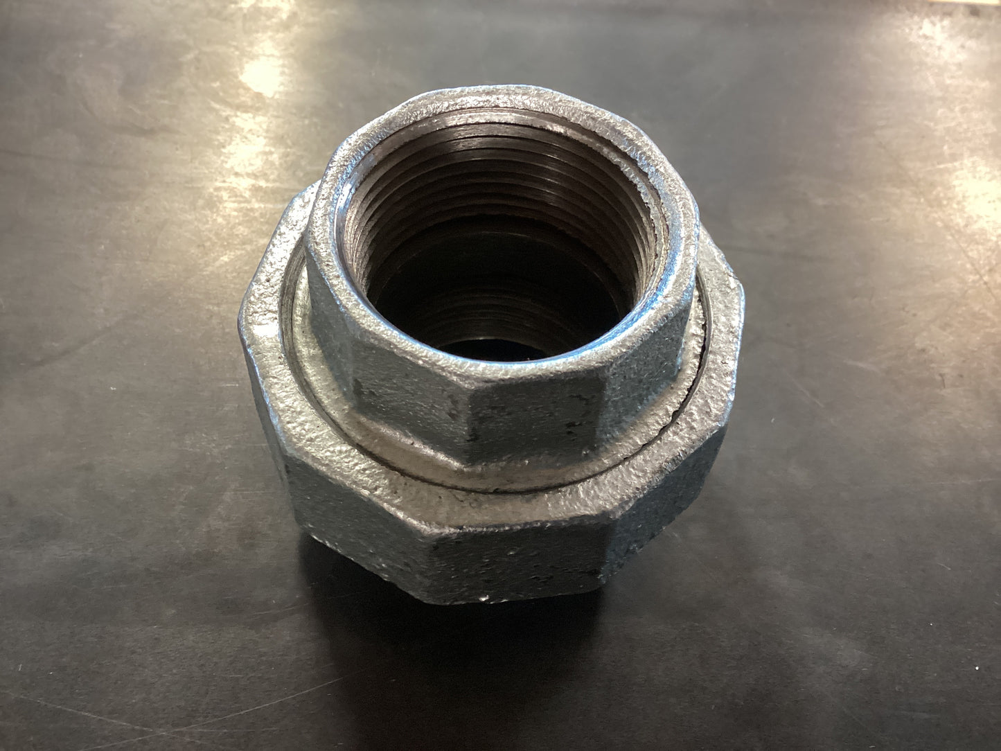 1-1/4” Galvanized Union PVC